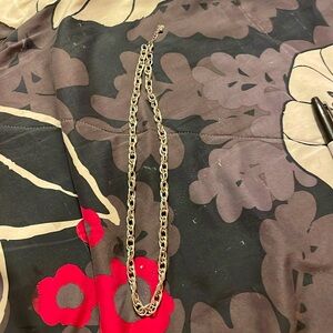 Silver chain link chunky necklace.